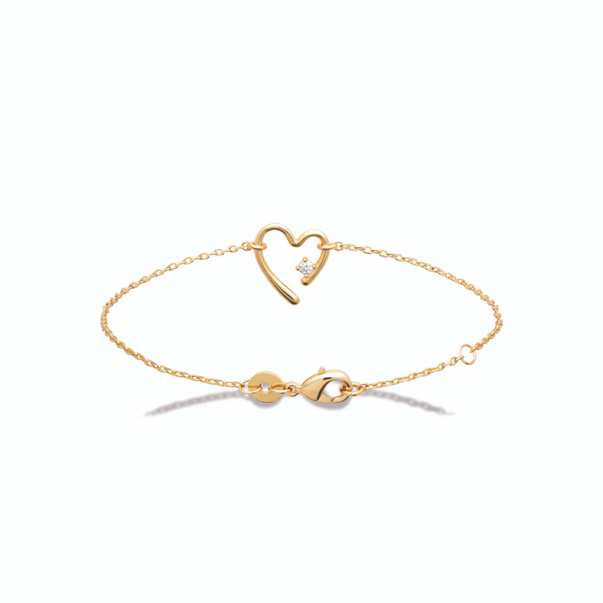 Bracelet chaîne fine cœur d’un trait et zircon en plaqué or