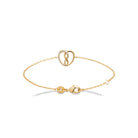 Bracelet chaîne fine cœurs entrelacés pavé et lisse en plaqué or