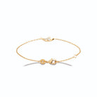 Bracelet chaîne fine croissant de lune et zircons en plaqué or