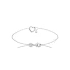 Bracelet chaîne fine deux cœurs entrelacés et pampille en argent 925 rhodié