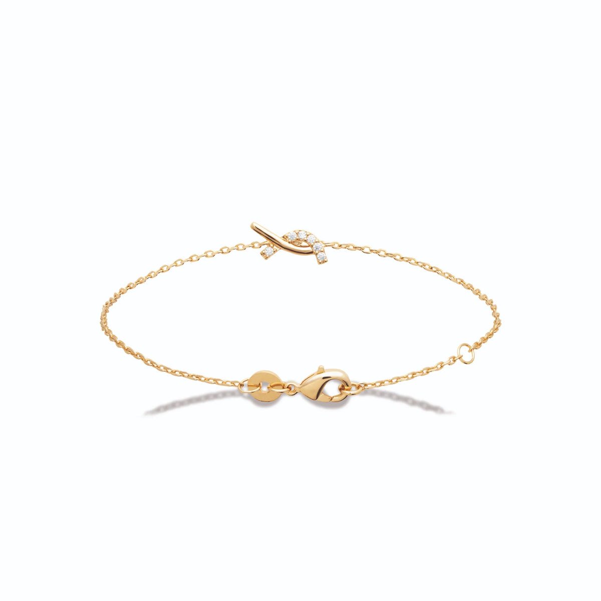 Bracelet chaîne fine fils noués et zircons en plaqué or