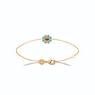 Bracelet chaîne fine fleur de pierres turquoise en plaqué or