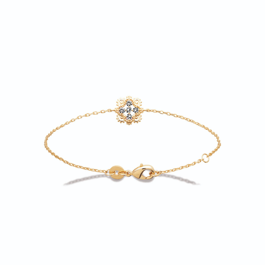 Bracelet chaîne fine fleur sertie d’un zircon en plaqué or, vue de face