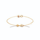 Bracelet chaîne fine infini et pierre rouge en plaqué or