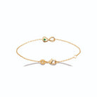 Bracelet chaîne fine infini et pierre verte en plaqué or