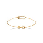 Bracelet chaîne fine maillon épingle et bille dorée en plaqué or
