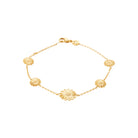 Bracelet chaîne fine marguerites dorées ciselées en plaqué or