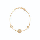Bracelet chaîne fine médaillon rosace ciselée et zircons en plaqué or