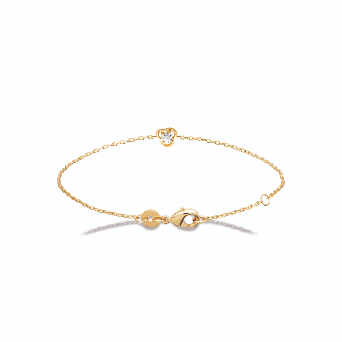 Bracelet chaîne fine nœud à trois boucles et zircon en plaqué or