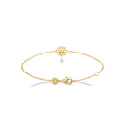 Bracelet chaîne fine nœud entrelacé et pampille zircon en plaqué or