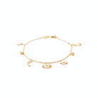 Bracelet chaîne fine pampilles soleils et lune en plaqué or