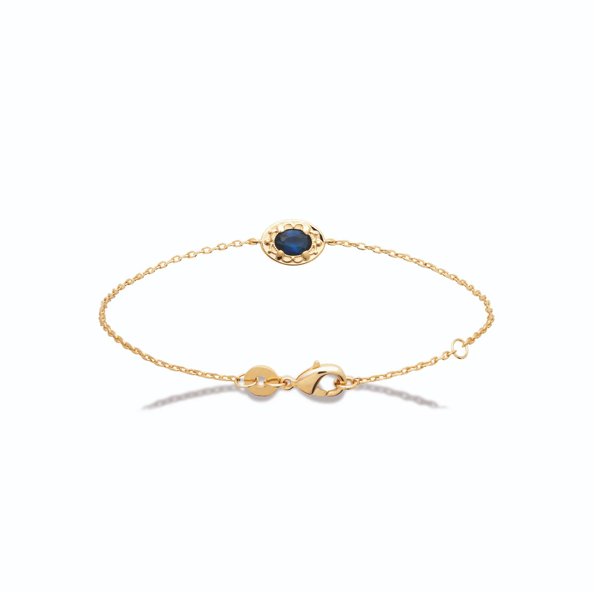 Bracelet chaîne fine pierre bleu nuit et halo de zircons en plaqué or