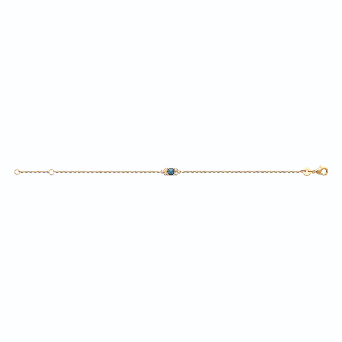 Bracelet chaîne fine pierre bleue coussin et zircons en plaqué or
