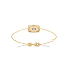 Bracelet chaîne fine plaque ajourée sertie d’un zircon en plaqué or