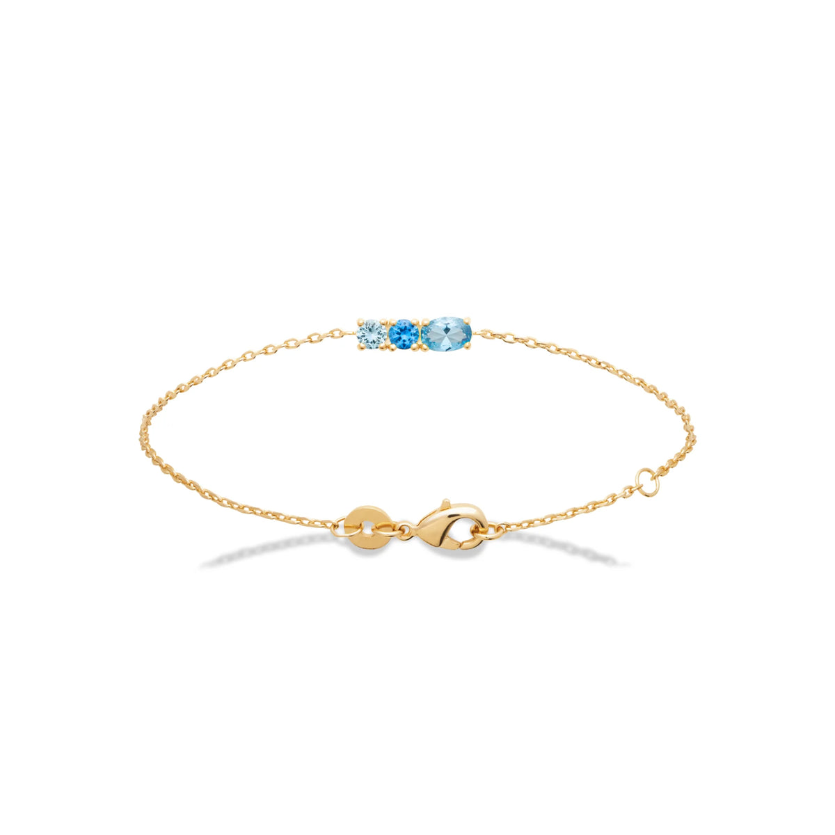 Bracelet chaîne fine trio de pierres bleues en plaqué or