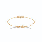 Bracelet chaîne fine trois zircons alignés en plaqué or