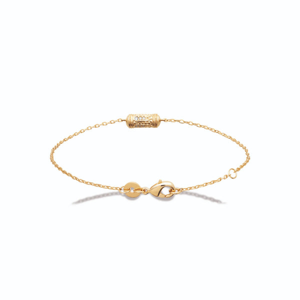 Bracelet chaîne fine tube ciselé ajouré et zircons en plaqué or