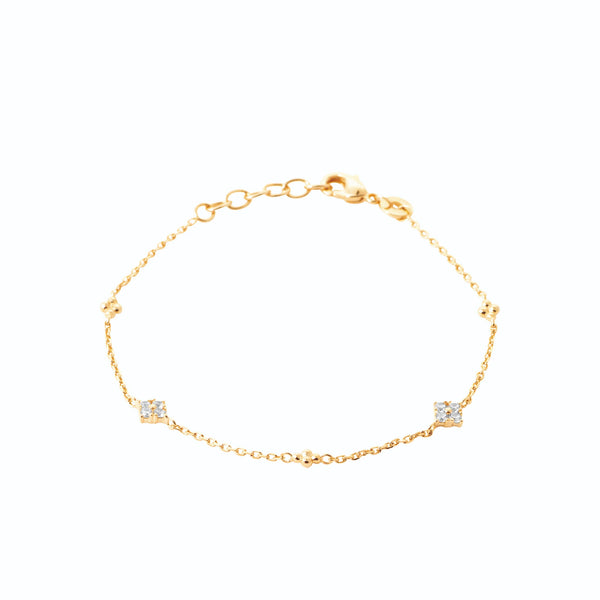 Bracelet chaîne à stations de zircons en plaqué or
