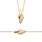 Bracelet coquille torsadée pavée de zircons en plaqué or