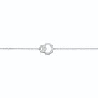 Bracelet deux anneaux entrelacés dont un pavé de zircons en argent 925, posé à plat sur toute sa longueur