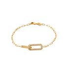 Bracelet deux maillons rectangulaires entrelacés dont un pavé en plaqué or
