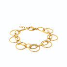 Bracelet double anneaux texturés entrelacés en acier PVD doré