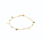 Bracelet gouttes de cristal vert et perles dorées en plaqué or