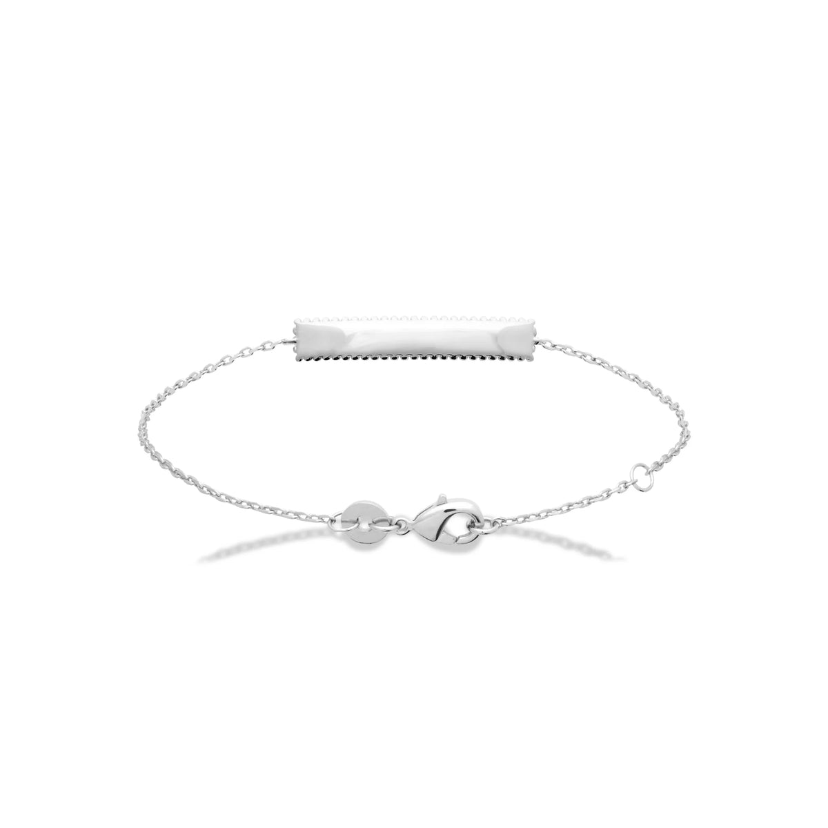 Bracelet identité chaîne fine à plaque crantée en argent rhodié