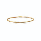 Bracelet jonc fil torsadé en plaqué or vu de profil