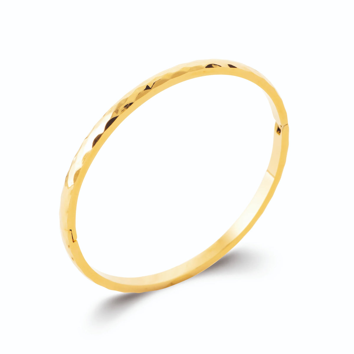 Bracelet jonc fin martelé en acier PVD doré