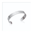 Bracelet jonc manchette quadrillée en acier
