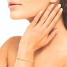Bracelet jonc ouvert ciselé en relief en plaqué or