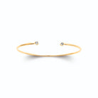 Bracelet jonc ouvert fin à extrémités perlées en plaqué or