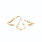 Bracelet jonc ouvert sinueux et zircons en plaqué or