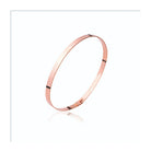 Bracelet jonc plat fin en plaqué or rose