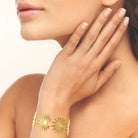 Bracelet maillons éventails striés en acier PVD doré