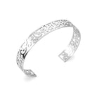 Bracelet manchette ajourée d’arabesques en acier inoxydable
