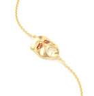 Bracelet Mélancolie en or jaune 18 carats, masque théâtre triste Rubis