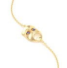 Bracelet Mélancolie en or jaune 18 carats, masque théâtre triste Saphir bleu