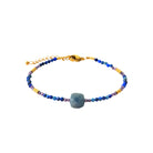 Bracelet perles bleues et iolite en acier PVD doré