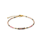 Bracelet perles et tubes de pierres naturelles roses en acier PVD doré