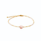 Bracelet perles fines et rhodonite en acier PVD doré