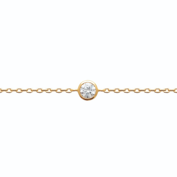 Bracelet petit rond de zircon serti clos en plaqué or, vue d’ensemble sur fond blanc