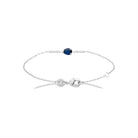 Bracelet pierre bleu nuit taille poire et barrettes de zircons en argent 925, vue d’ensemble sur fond blanc