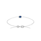Bracelet pierre bleu nuit taille poire et halo de zircons en argent 925, vue d’ensemble sur fond blanc
