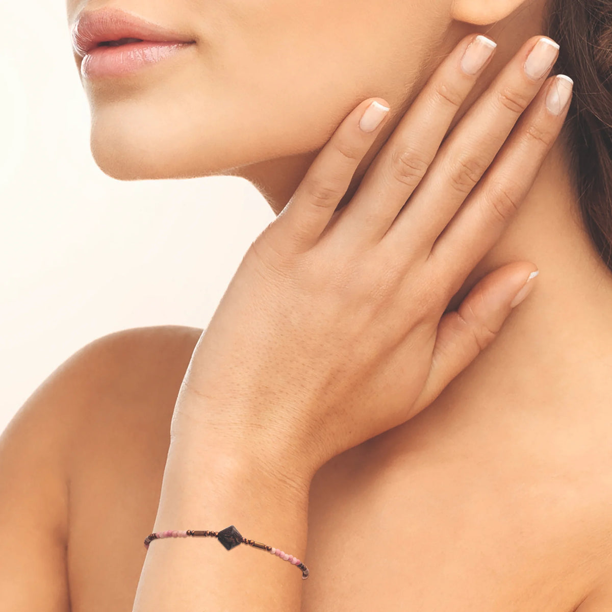 Bracelet rhodonite et bicône de pierre en acier PVD doré