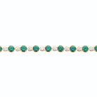 Bracelet rivière de pierres vertes et zircons en plaqué or