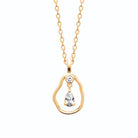 Collier anneau galet et zircon poire en plaqué or