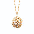 Collier boule ajourée de fleurettes et zircons en plaqué or
