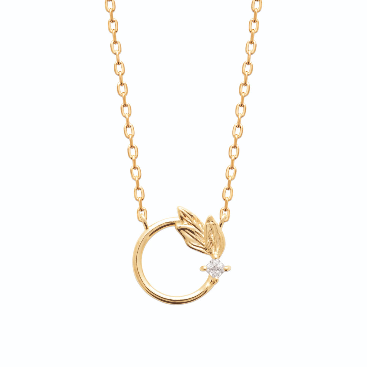 Collier cercle ouvert, rameau de feuilles et zircon en plaqué or